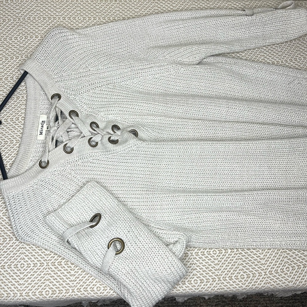 cream sweater with ties